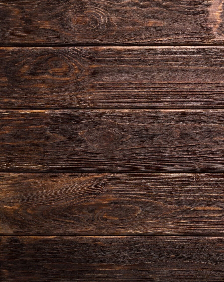 Dark wooden planks with natural grain.